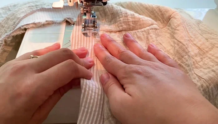 Understitch seam allowance to neckline facing.