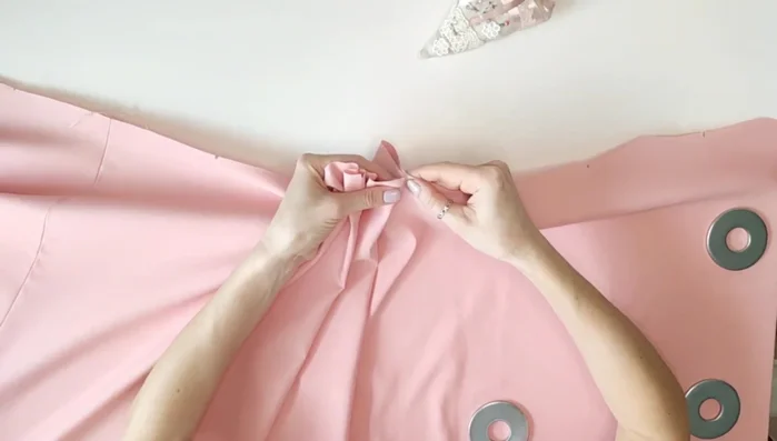 Stitch the front and back skirts together, press seams open. Make pleats, matching the markings on your pattern.