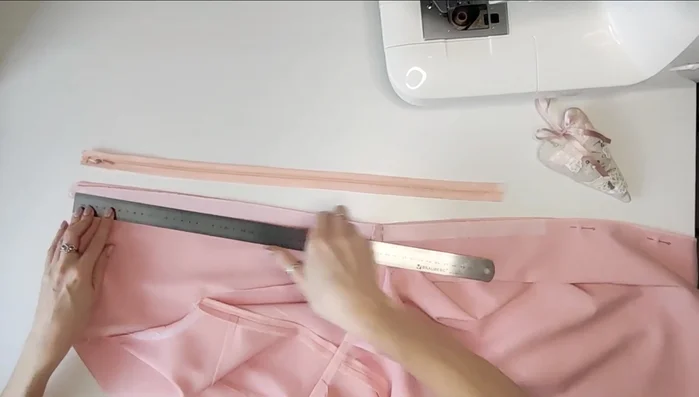 Optional: Add button and loop closure at center back.