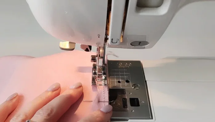 Attach sleeves to armholes. Gather bottom of sleeves and cuffs. Attach cuffs.