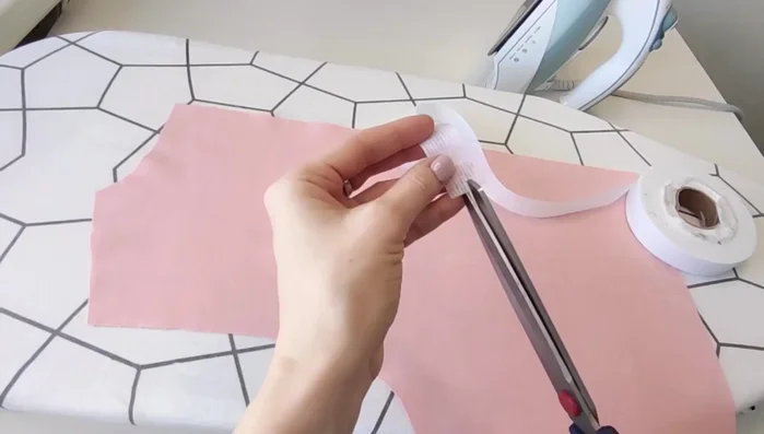 Apply interfacing to the wrong side of the pieces to prevent stretching.