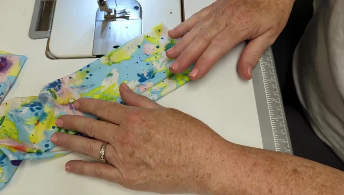 Sew a stitch down the end of each side to create a defined edge.