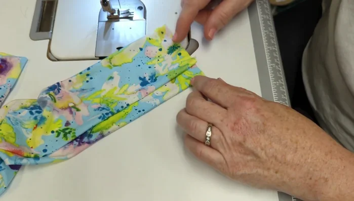 Pull on the ends to make the knot more defined.