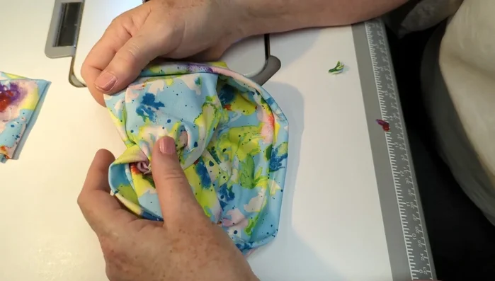 Pull on the ends to make the knot more defined.