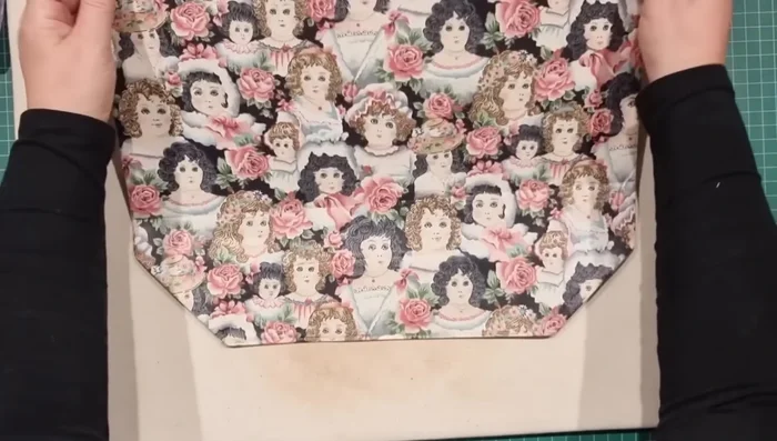 Turn and Press: Turn the bag right side out through the lining opening. Press the seams. Create boxy corners by pressing the side seams and bottom edges flat.