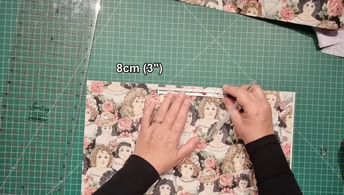 Attach Handles: Measure and mark handle placement (3 inches from center) on the outer fabric. Sew handles in place.