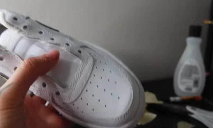 Replace laces. Optionally, replace silver aglets with black ones for a cleaner look.