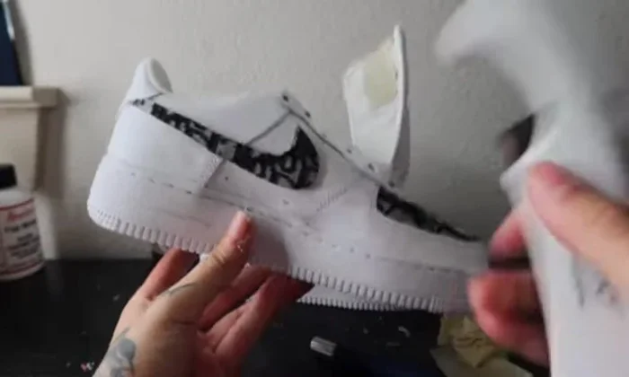 Replace laces. Optionally, replace silver aglets with black ones for a cleaner look.