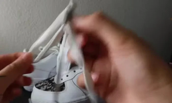 Replace laces. Optionally, replace silver aglets with black ones for a cleaner look.