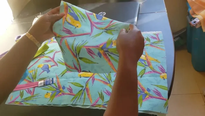 Attach zipper. Place the zipper between the right sides of the main fabric and lining, pin, and sew securely. (Double stitch if using needle and thread).