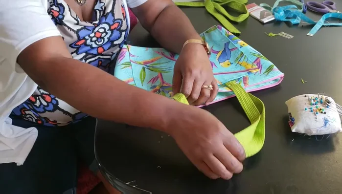 Finish the bag. Sew down the remaining openings to create a clean finish and secure the lining. You're done!