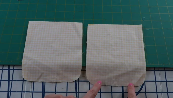 Sew and turn pocket pieces right side out, then embroider.