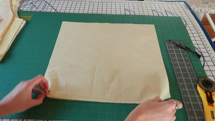 Cut out pocket pieces for the yellow gingham vest.