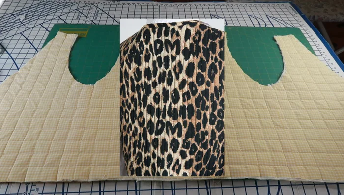 Quilt the leopard vest using vertical lines only (half-inch apart).