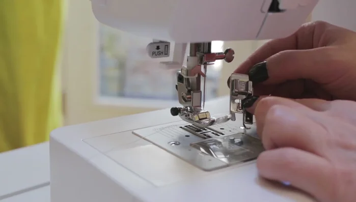 Overcast all raw edges using the foot guide for a neat finish.