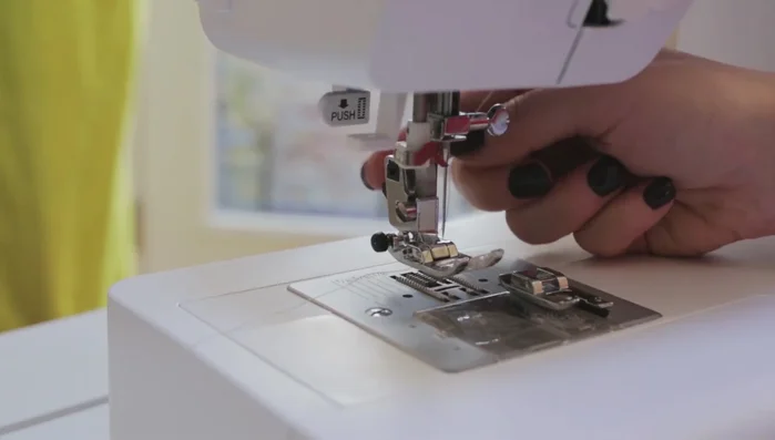 Overcast all raw edges using the foot guide for a neat finish.