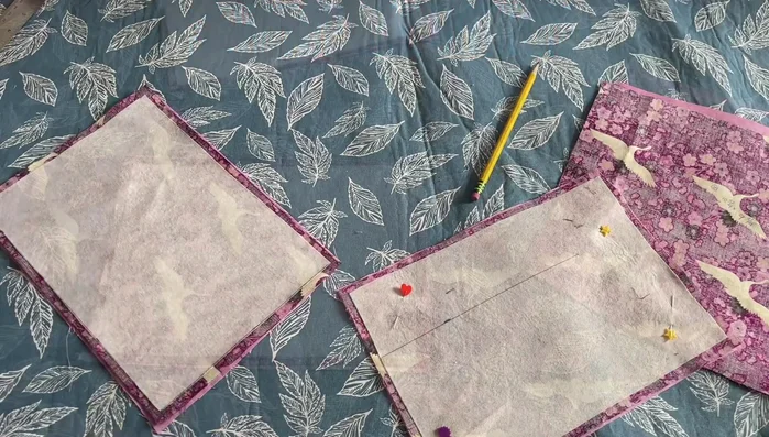Place the two completed panels right sides together. Sew the top and bottom edges.