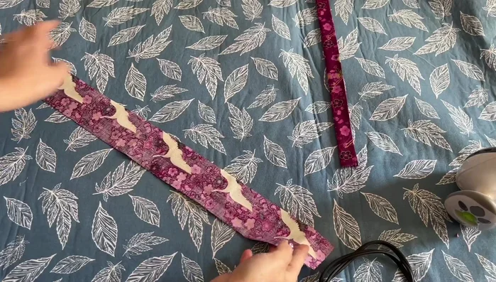 Sew the long edges of each handle piece together.