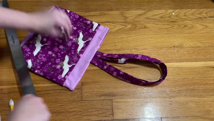 Add drawstrings and buttons.