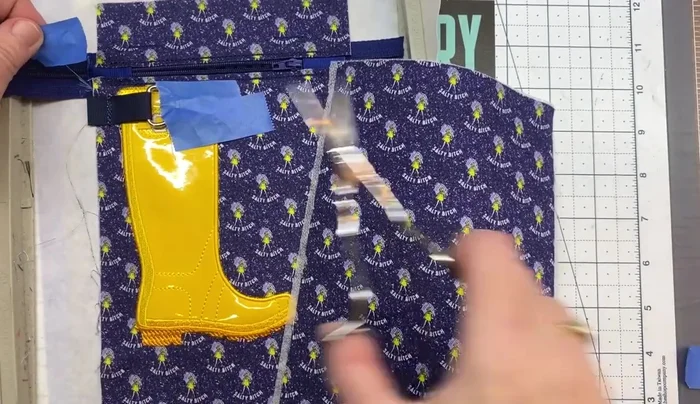 Attach the back fabric, tape, and run color stop 18.