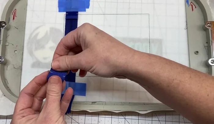 Tape the ribbon pieces in place.