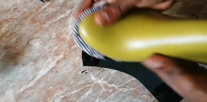 Attach the front piece to the base/sole using fingers to ensure correct placement and alignment. (Specific finger placement technique is shown.)