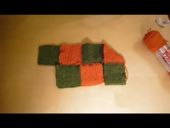 Turn the slipper over and sew the flap to the side.