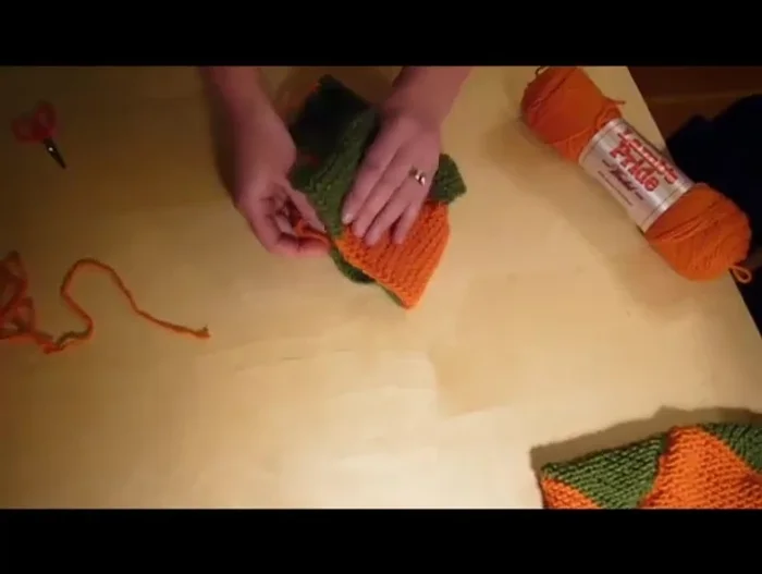 Sew the orange (heel) section to the green section.
