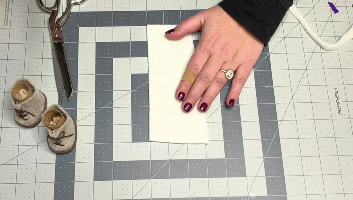 Glue the cuff to the inside of the boot at the top edge.