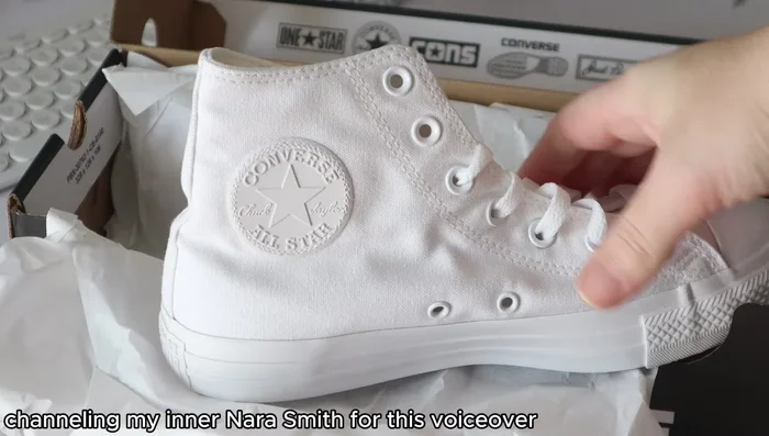 Unlace the shoes completely and tuck the tongue underneath the toe cap.