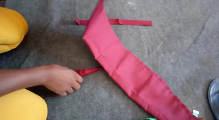 Turn both the main headband and elastic casing to the right side, press them.