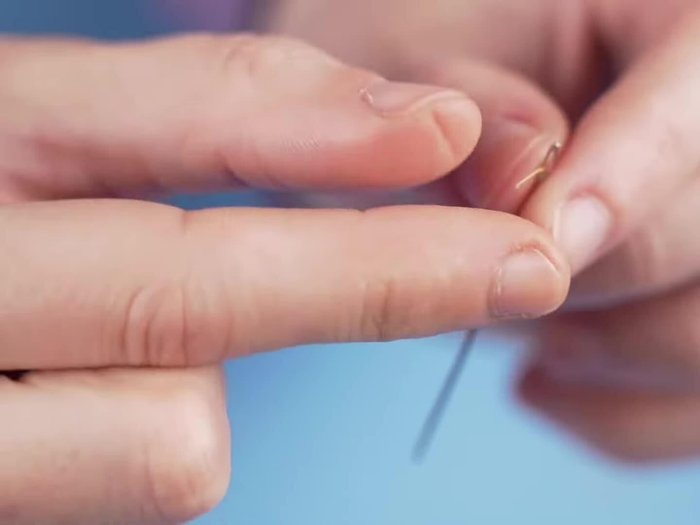 Turn the fabric inside out.