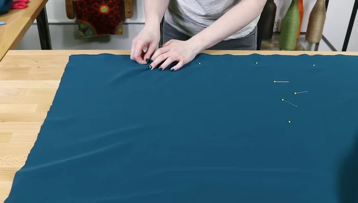 Sew Fabric Pieces (if necessary): Pin and sew the fabric pieces together using a 1/2 inch seam allowance. Match patterns if desired.