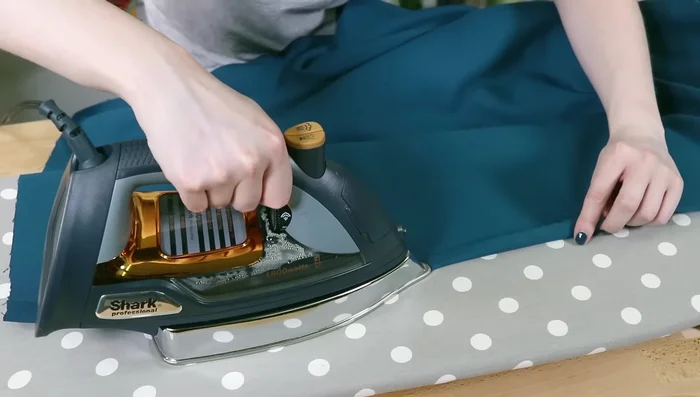 Hemming: Fold and iron the edges of your fabric, creating a double folded hem (1/2 inch). Iron all the way to the corner.