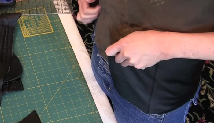 Adjust for fit: Measure and add extra trapezoid pieces to close the gap in the back. Ensure a small gap remains to allow for stretching when worn.