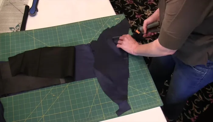 Prepare the lining: Cut lining pieces (5 1/2 inches wide finished) from a recycled jacket lining. Piece together if necessary.