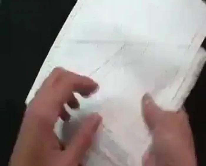 Add fabric pieces number two and three, enclosing the raw edges of the frog's feet.