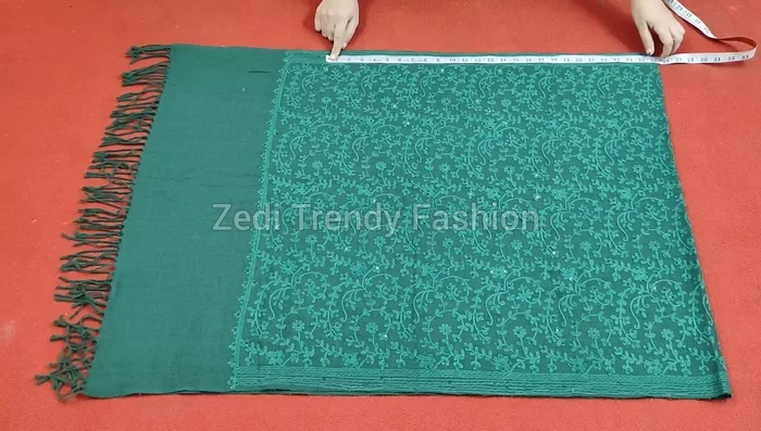 Cut the marked shape from the doubled shawl.