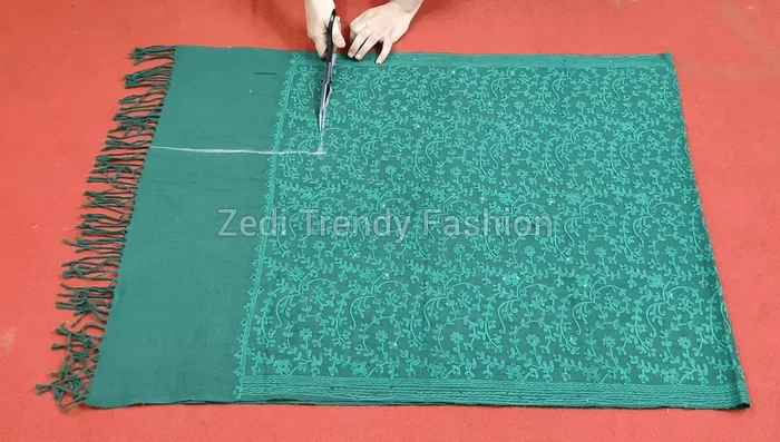 Cut the marked shape from the doubled shawl.