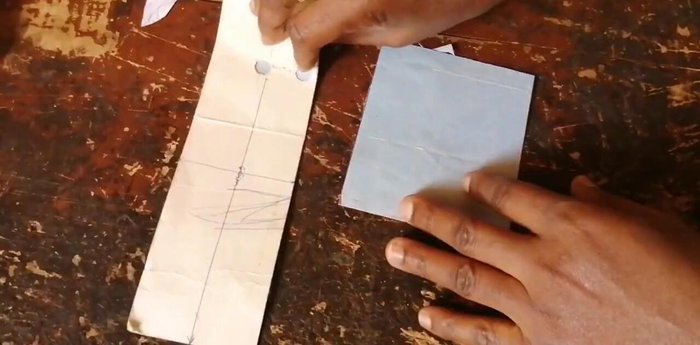 Cut the leather pieces according to the measurements: approximately 23cm length and 6.5cm width for the white leather; 11cm length and 9.5cm width for the brown leather. (Adjustments based on desired size).