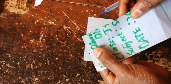 Locate the center of both leather pieces and align them to determine the punch points for the openings. 